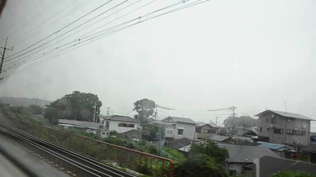 View cityscape of Osaka on Rapid train between go to Wakayama city on July 8, 2015 in Osaka, Japan