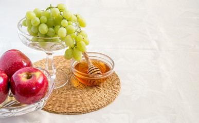 Honey, apples and grapes for Jewish New Year celebration.