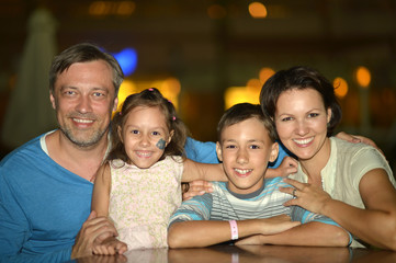 Happy family  in cafe