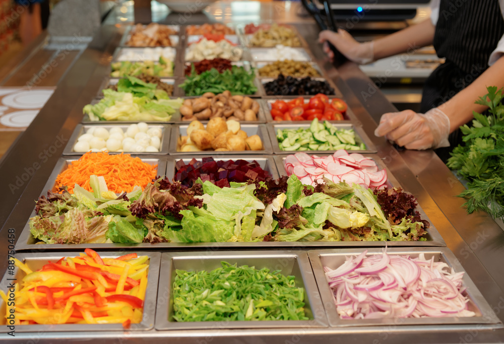 Wall mural salad bar with various fresh vegetables