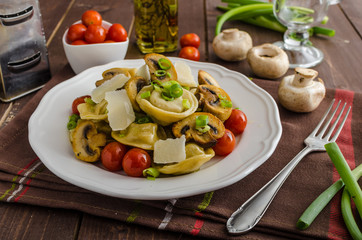 Tortellini stuffed with a mixture of vegetable spring