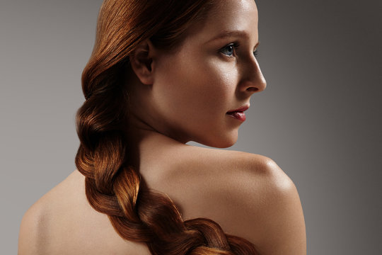 redhead girl with elegant hairstyle.