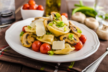 Tortellini stuffed with a mixture of vegetable spring