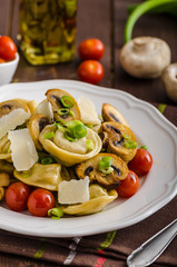 Tortellini stuffed with a mixture of vegetable spring