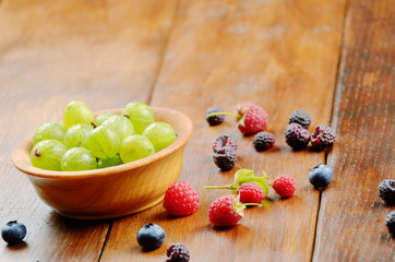 Wooden bowl with organic berries