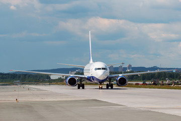 Fototapeta na wymiar modern aircraft on the runway