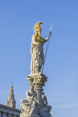 Fototapeta na wymiar Athena Fountain near Austrian Parliament (1902). Vienna, Austria