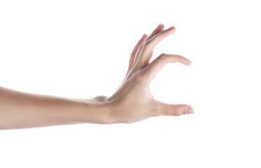 Female hand to create a collage, isolated on white