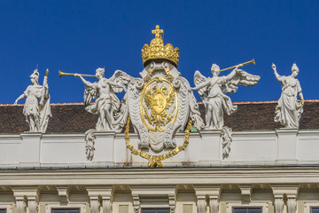 Fototapeta na wymiar Decorations on Hofburg palace, Vienna; Austria.