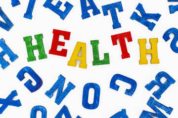 Series "Education - school subjects": Word "Health" made from colorful wooden letters
