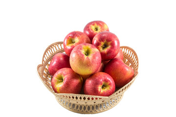 red apple in wooden basket