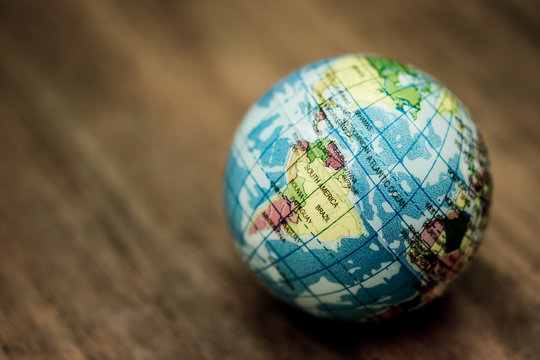 An image of a ball with world map