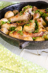 Crisp-tender chicken baked  with roasted carrots and potatoes, shallow focus