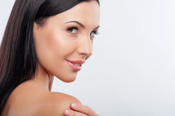 Fototapeta premium Beautiful young healthy woman prefers skin care