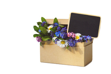 Mothers day flowers and miniature blank blackboard in paper gift box 
