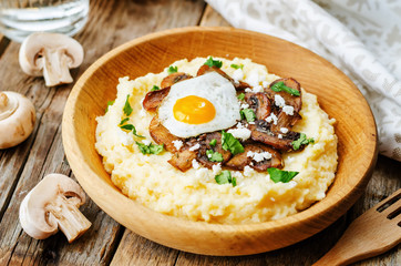 polenta with caramelised mushrooms, egg, cilantro and cheese