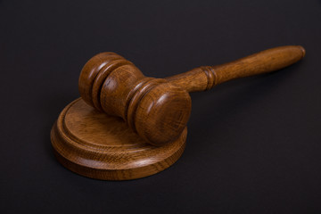 Wooden brown Judges gavel or auction hammer
