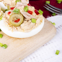 stuffed eggs with tuna, olives and paprika
