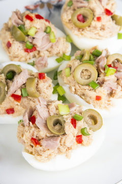 stuffed eggs with tuna, olives and paprica