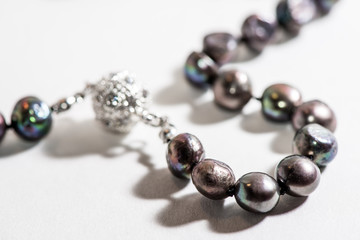 Black pearl necklace with diamond pendant