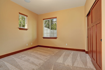 Unfurnished room with beige interior paint.