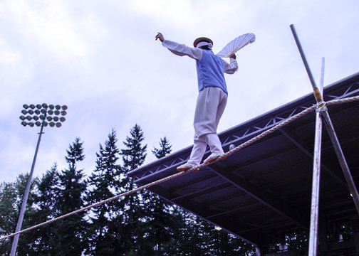 Korean tightrope walker at festival grounds
