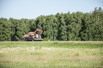 excavator on a platform