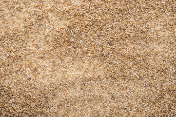 Fototapeta na wymiar Roughly grind barley texture background