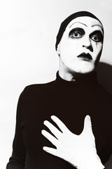 Theatrical actor with dark mime makeup