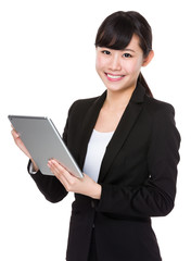 Asian young Businesswoman use of the tablet pc