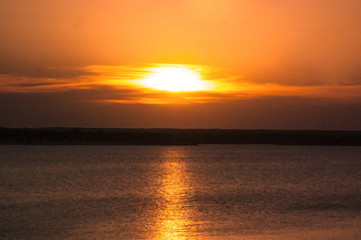 beautiful golden  sun set at lake for background