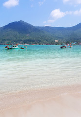 Fototapeta na wymiar tropical Thailand sea view with sand beach, mountain and clear sky on background