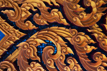 traditional clay ornament pattern in one of the temples in the Asia, Thailand