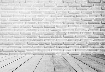 interior of old white brick wall with old white wooden floor.