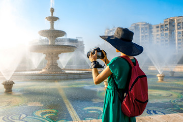 Photographing central fountain in Bucharest city - obrazy, fototapety, plakaty