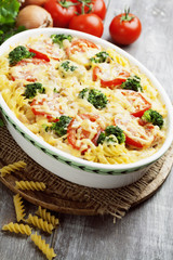 Casserole with pasta, broccoli and tomatoes
