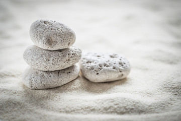  zen  stones on the sand