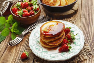 Homemade pancake with strawberry jam