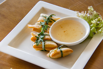 Cheese wrapped,Fried dumplings with ham and cheese wrapped inside