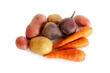 Fresh vegetables carrots, beetroots and potatoes isolated on whi