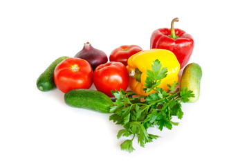 Composition with raw vegetables on white