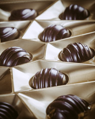 Chocolate candies in a golden box