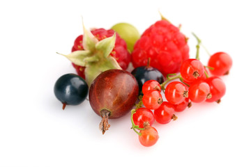 Heap of fresh berries isolated on white