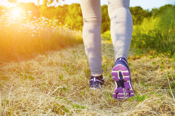 Woman running in a field