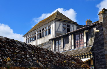 Ancient village on Mont Saint Michel, traditional stone building, France