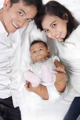Happy Asian family overhead