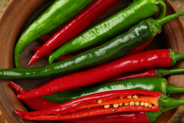 Hot peppers in bowl close up