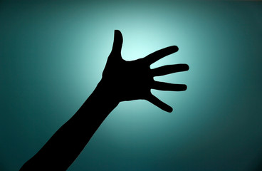 Silhouette of hand close up