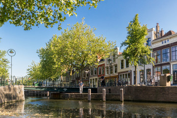 Fototapeta na wymiar Canal bridge over Gouwe River in the city of Gouda, Netherlands