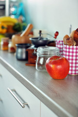 Composition with different utensils on wooden wooden table in kitchen